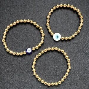Elegant Gold Beaded Bracelets with Evil Eye Charm